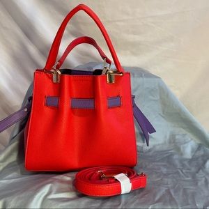 {2/20} Red and Purple Faux Leather Handbag